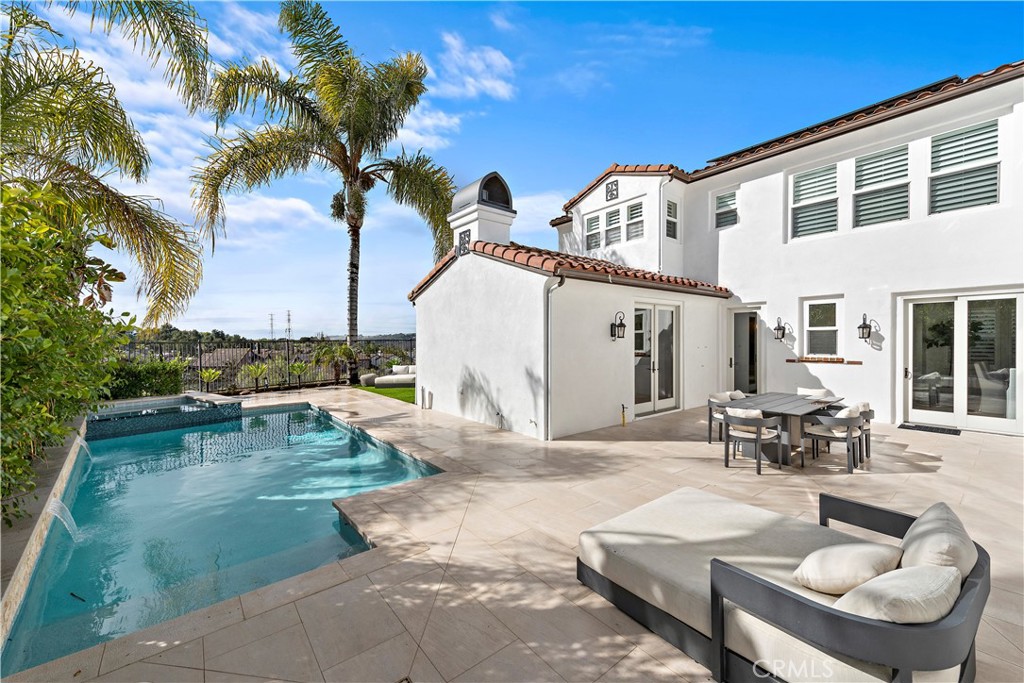 8 Kane Lane Ladera Ranch, CA 92694 - Photo 45 of 49 a view of a house with patio porch and sitting area
