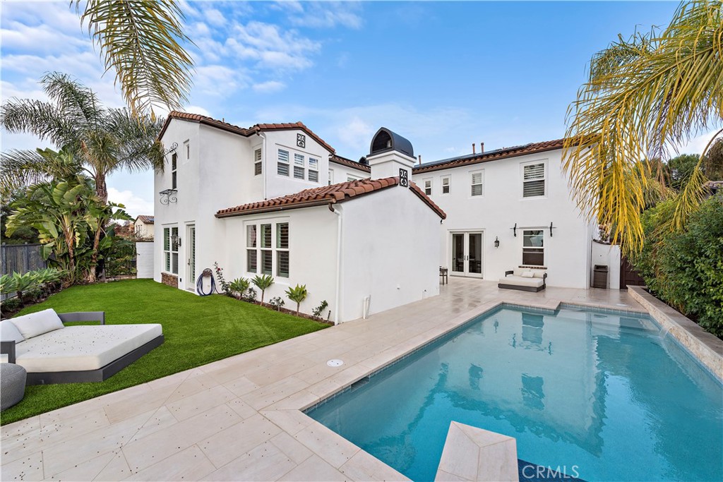 8 Kane Lane Ladera Ranch, CA 92694 - Photo 49 of 49 a view of a white house with a yard