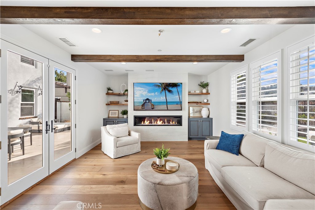8 Kane Lane Ladera Ranch, CA 92694 - Photo 8 of 49 a living room with furniture and a large window