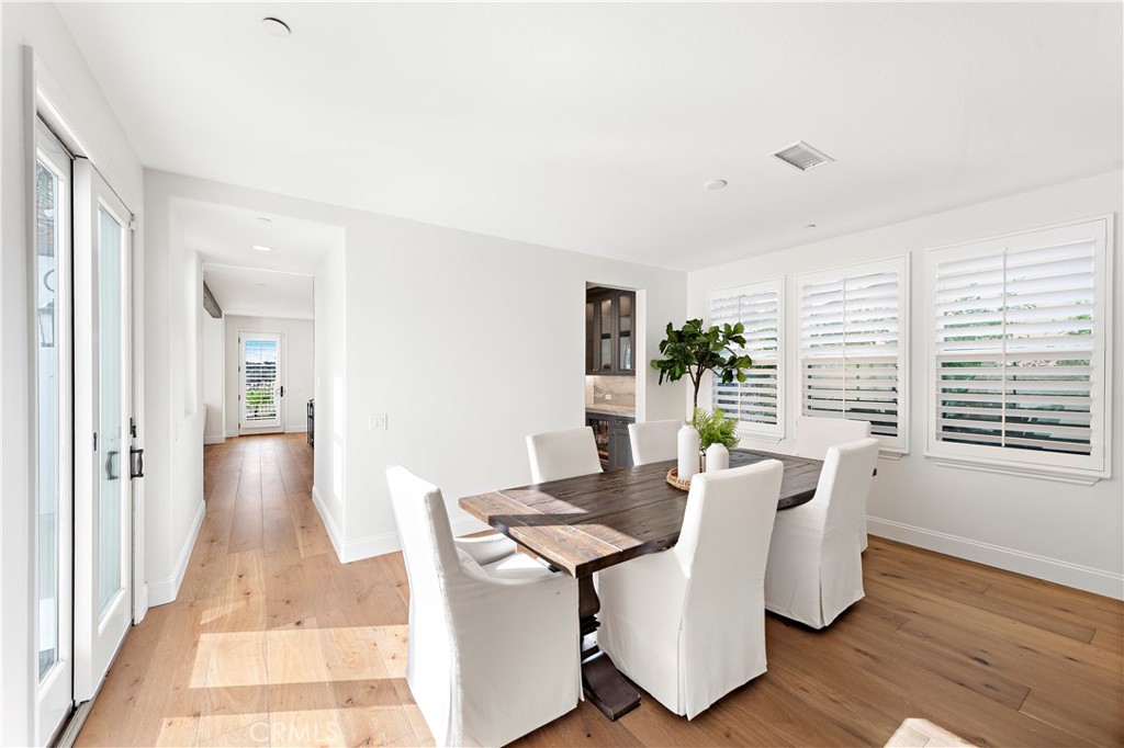 8 Kane Lane Ladera Ranch, CA 92694 - Photo 10 of 49 a living room with furniture and wooden floor
