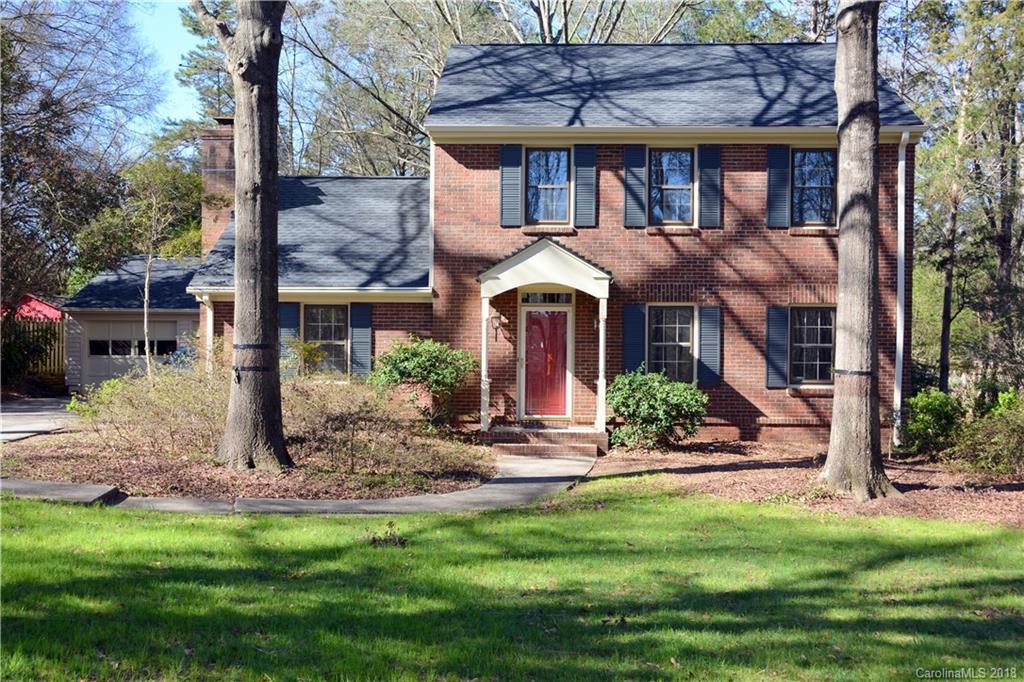 8700 Houston Ridge Road Charlotte, NC 28277 - Photo 2 of 22 a front view of a house with a yard table and chairs
