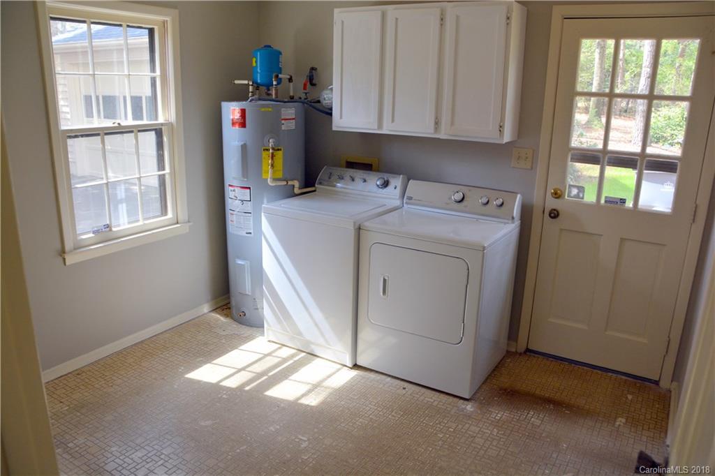 8700 Houston Ridge Road Charlotte, NC 28277 - Photo 12 of 22 a utility room with dryer and washer