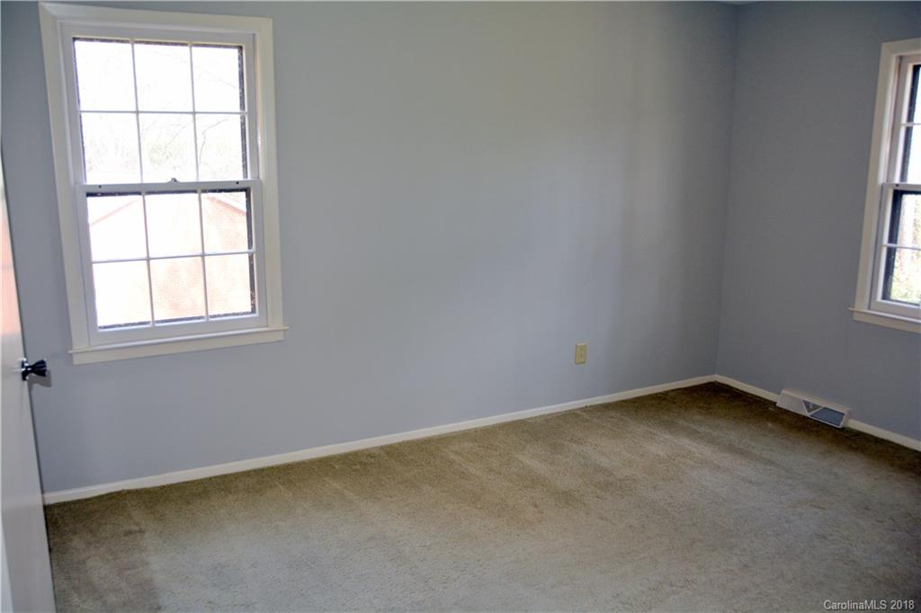 8700 Houston Ridge Road Charlotte, NC 28277 - Photo 16 of 22 an empty room with a window