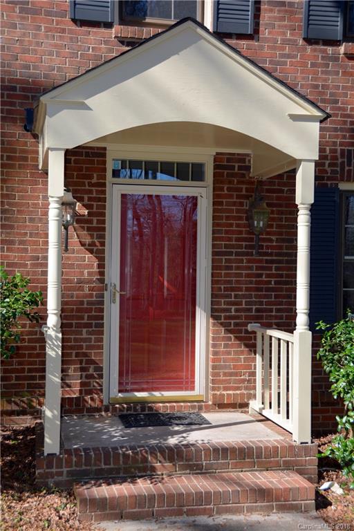 8700 Houston Ridge Road Charlotte, NC 28277 - Photo 3 of 22 a front view of a house with a garden