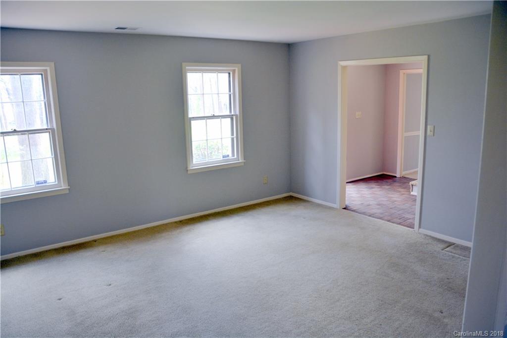 8700 Houston Ridge Road Charlotte, NC 28277 - Photo 7 of 22 an empty room with windows