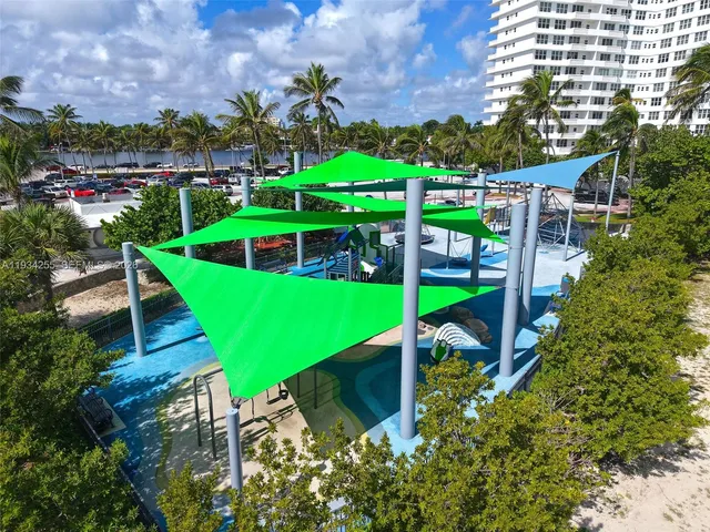 a view of a park with a slide