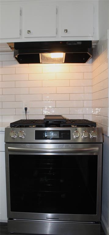 2506 Vincent Street Brownwood, TX 76801 - Photo 12 of 40 a stove top oven sitting inside of a kitchen