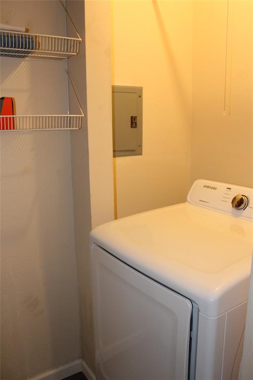 2506 Vincent Street Brownwood, TX 76801 - Photo 22 of 40 a utility room with dryer and washer