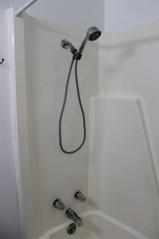 2506 Vincent Street Brownwood, TX 76801 - Photo 28 of 40 a bathroom with a sink and a window