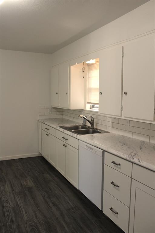 2506 Vincent Street Brownwood, TX 76801 - Photo 7 of 40 a room with a sink cabinets and a window