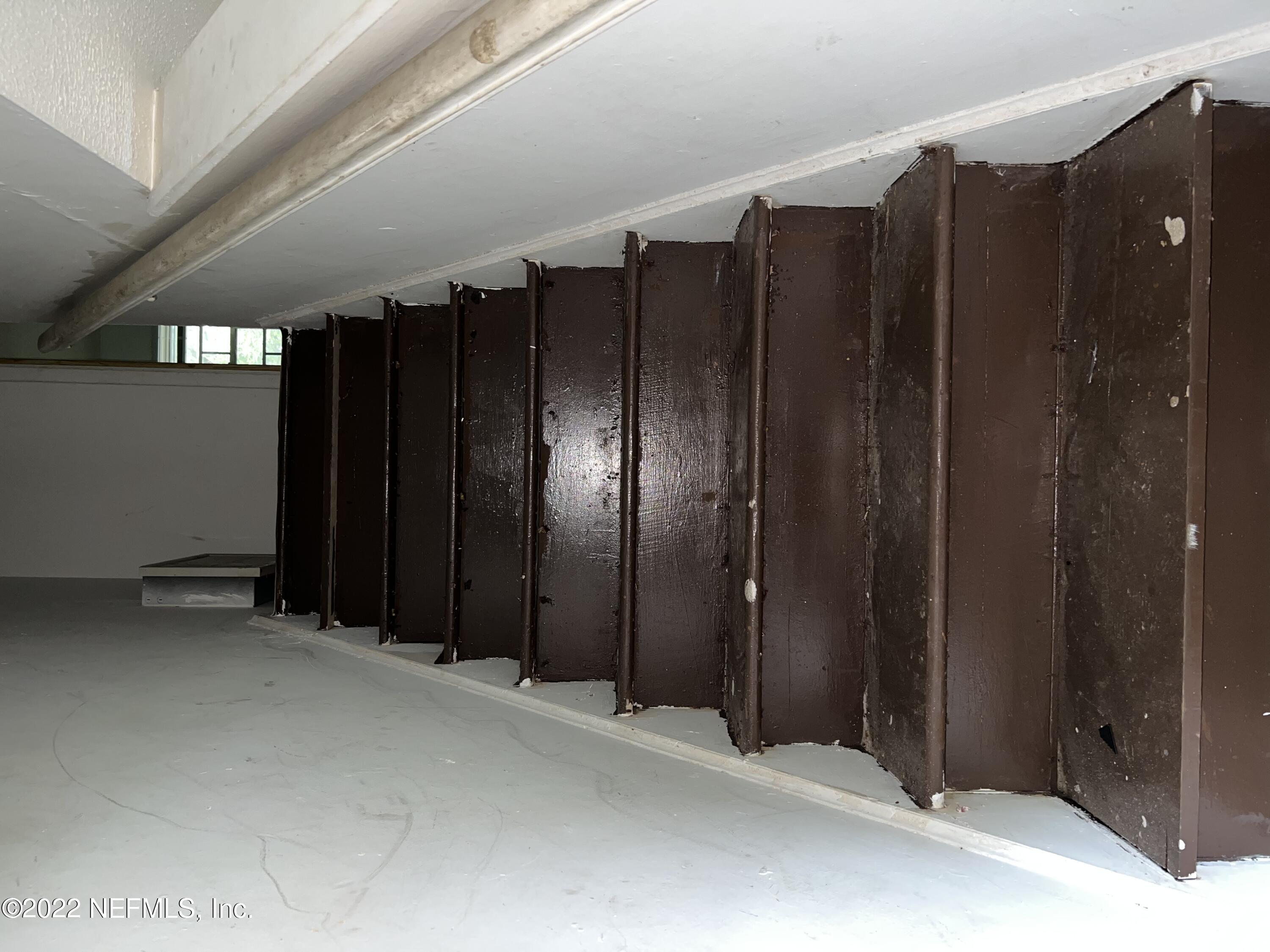 4423 Moncrief Road Jacksonville, FL 32209 - Photo 11 of 47 a view of a garage with wooden fence