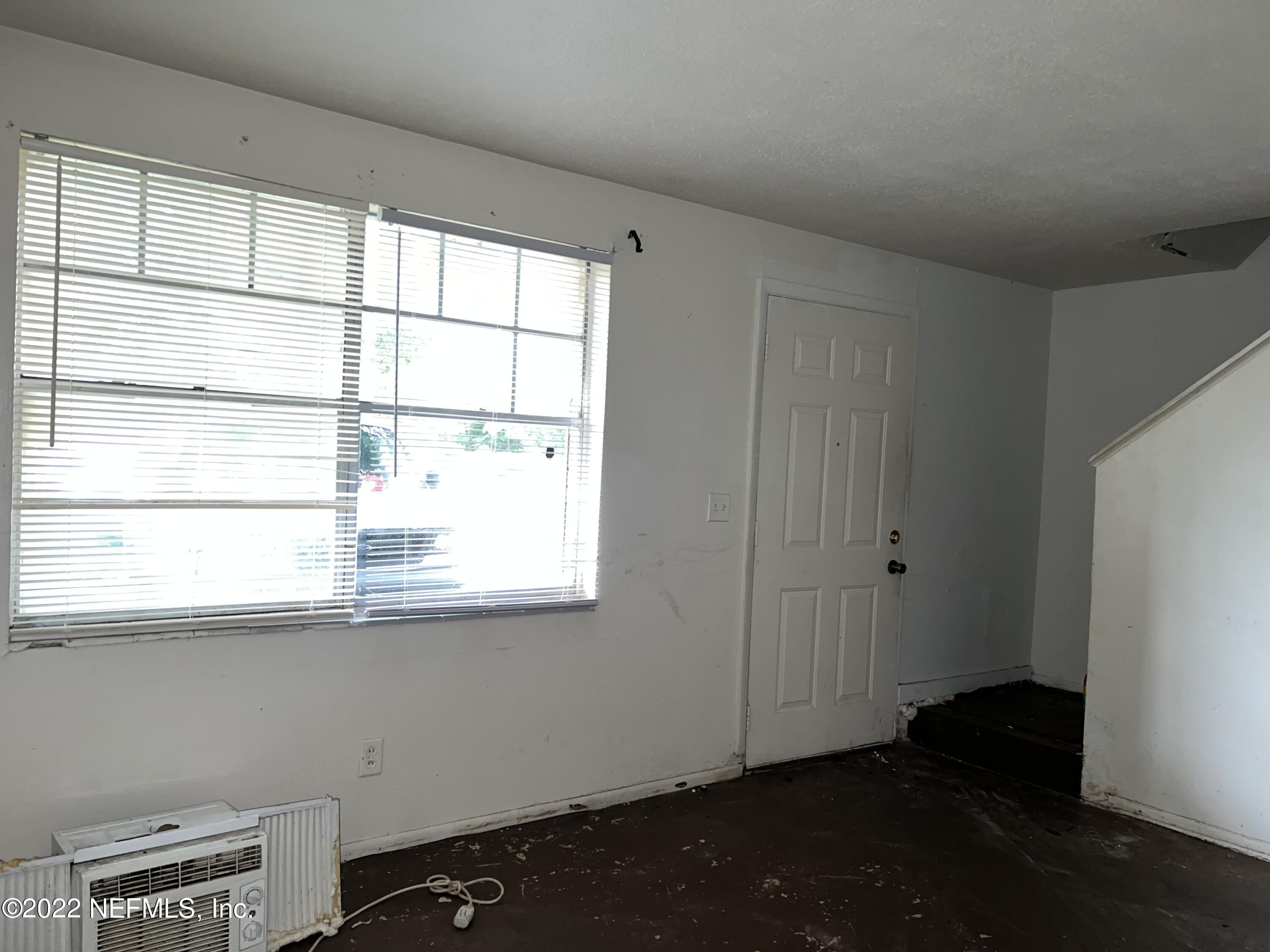 4423 Moncrief Road Jacksonville, FL 32209 - Photo 2 of 47 a view of a window in an empty room