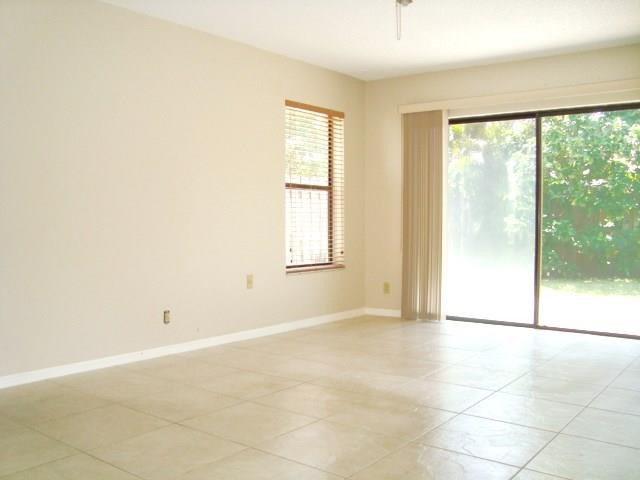 11460 Woodchuck Drive Boca Raton, FL 33428 - Photo 14 of 32 a view of an empty room with a window
