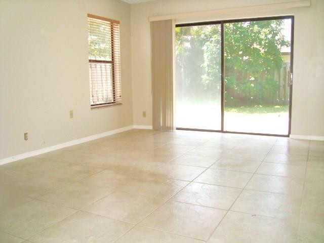 11460 Woodchuck Drive Boca Raton, FL 33428 - Photo 15 of 32 a view of an empty room with a window