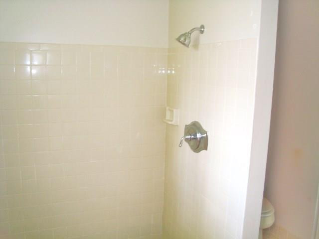 11460 Woodchuck Drive Boca Raton, FL 33428 - Photo 17 of 32 a bathroom with a shower