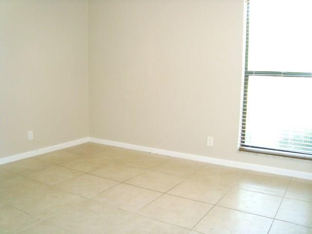 11460 Woodchuck Drive Boca Raton, FL 33428 - Photo 20 of 32 close up of a white marble wall
