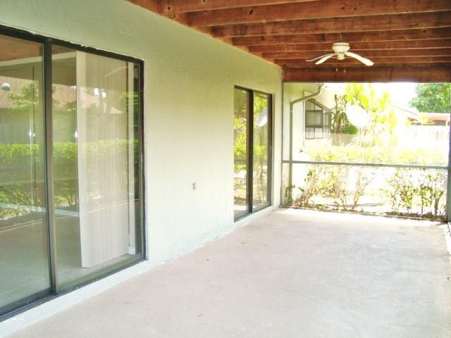 11460 Woodchuck Drive Boca Raton, FL 33428 - Photo 23 of 32 a view of a room with a large window