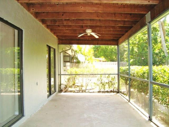 11460 Woodchuck Drive Boca Raton, FL 33428 - Photo 24 of 32 a view of an empty room with a window