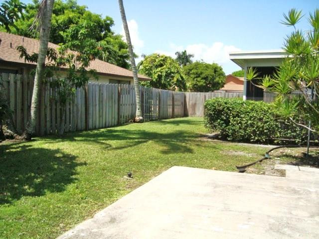 11460 Woodchuck Drive Boca Raton, FL 33428 - Photo 28 of 32 a view of a backyard