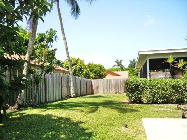 11460 Woodchuck Drive Boca Raton, FL 33428 - Photo 29 of 32 a view of a house with backyard and sitting area