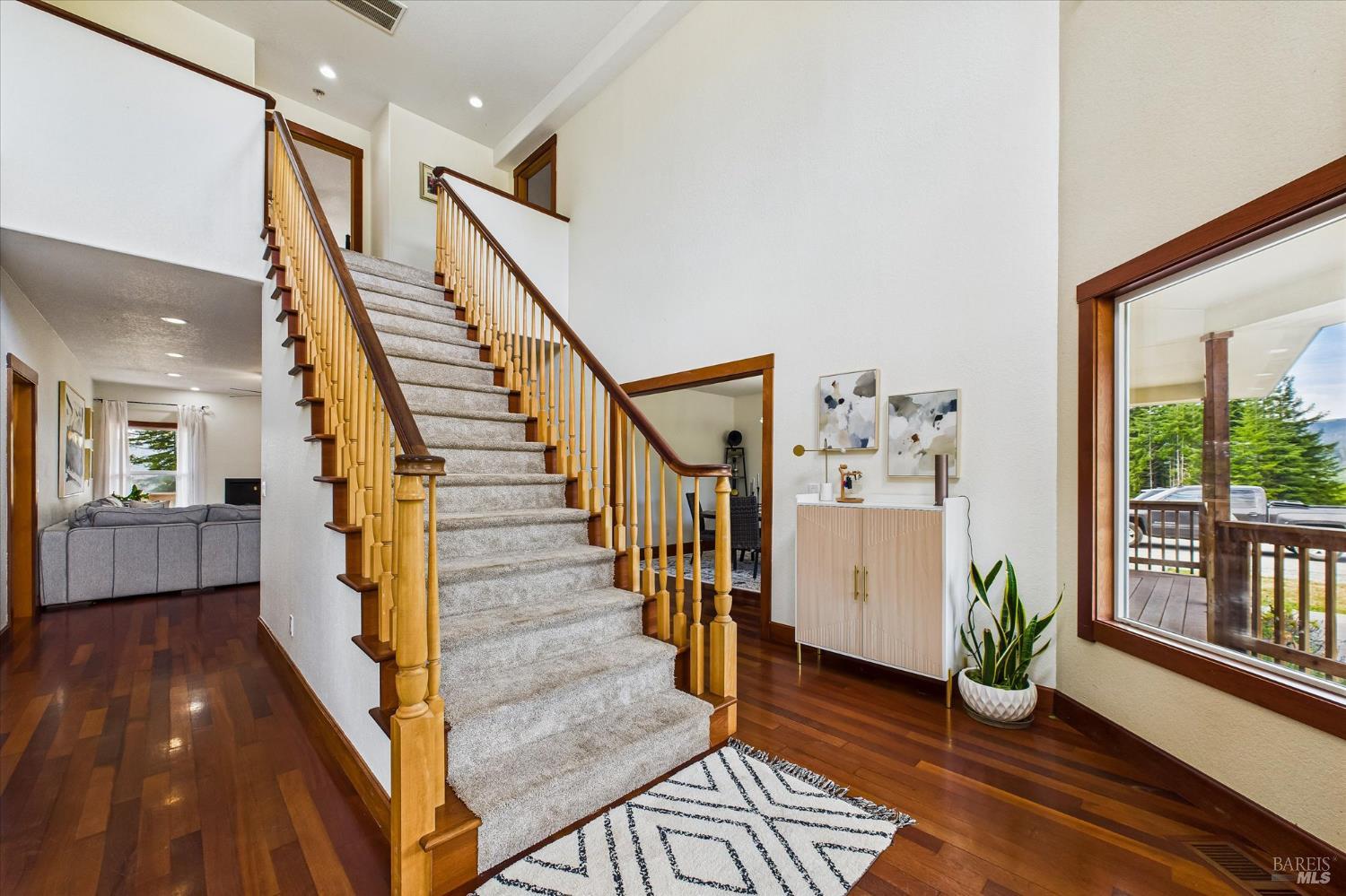 1150 Dinsmore Ranch Road Rio Dell, CA 95562 - Photo 19 of 71 a view of entryway with wooden floor and stairs
