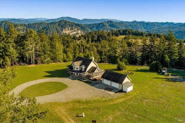 a view of a lake with a mountain in the background