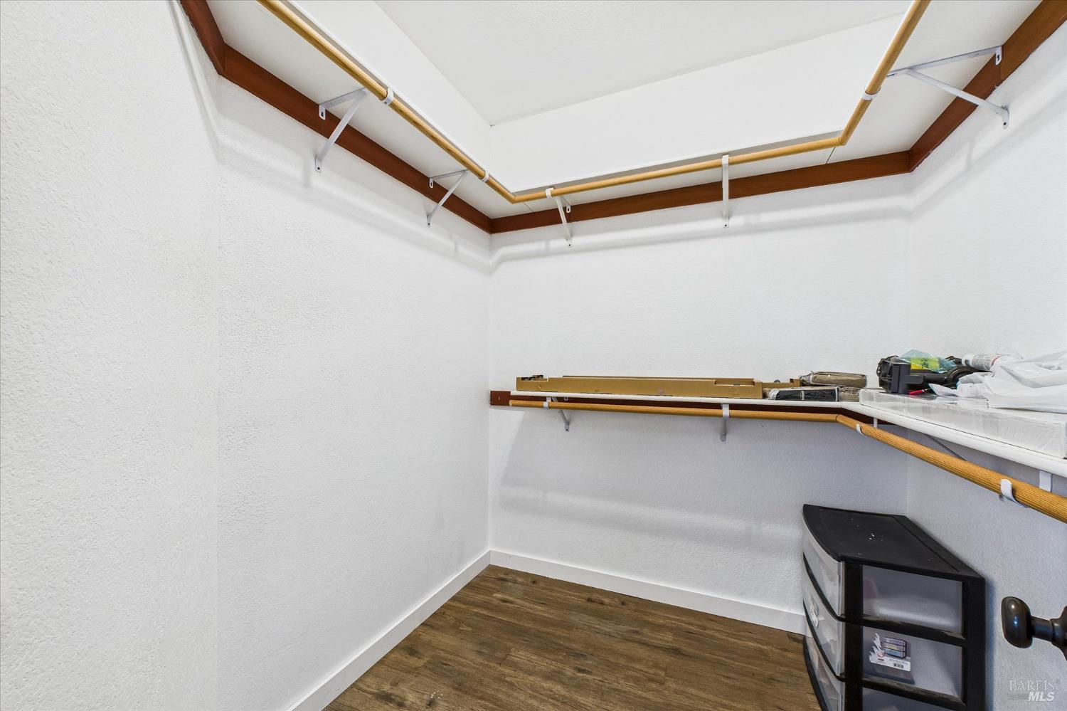 1150 Dinsmore Ranch Road Rio Dell, CA 95562 - Photo 44 of 71 a view of a room with wooden floor and a potted plant