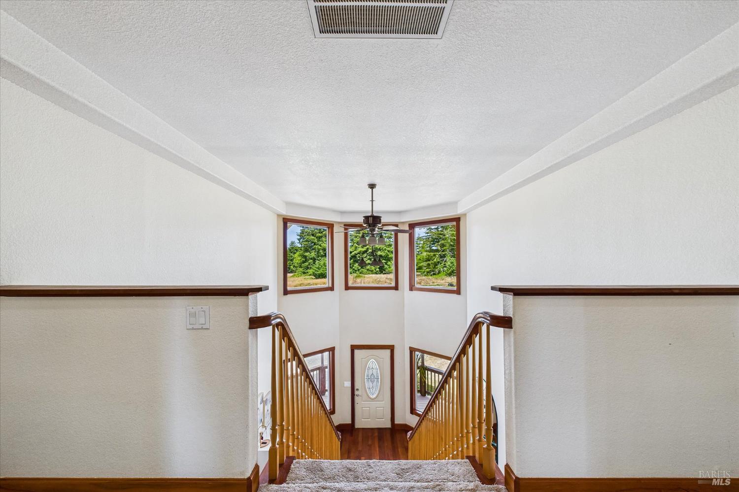 1150 Dinsmore Ranch Road Rio Dell, CA 95562 - Photo 47 of 71 a view of a hallway with furniture and window