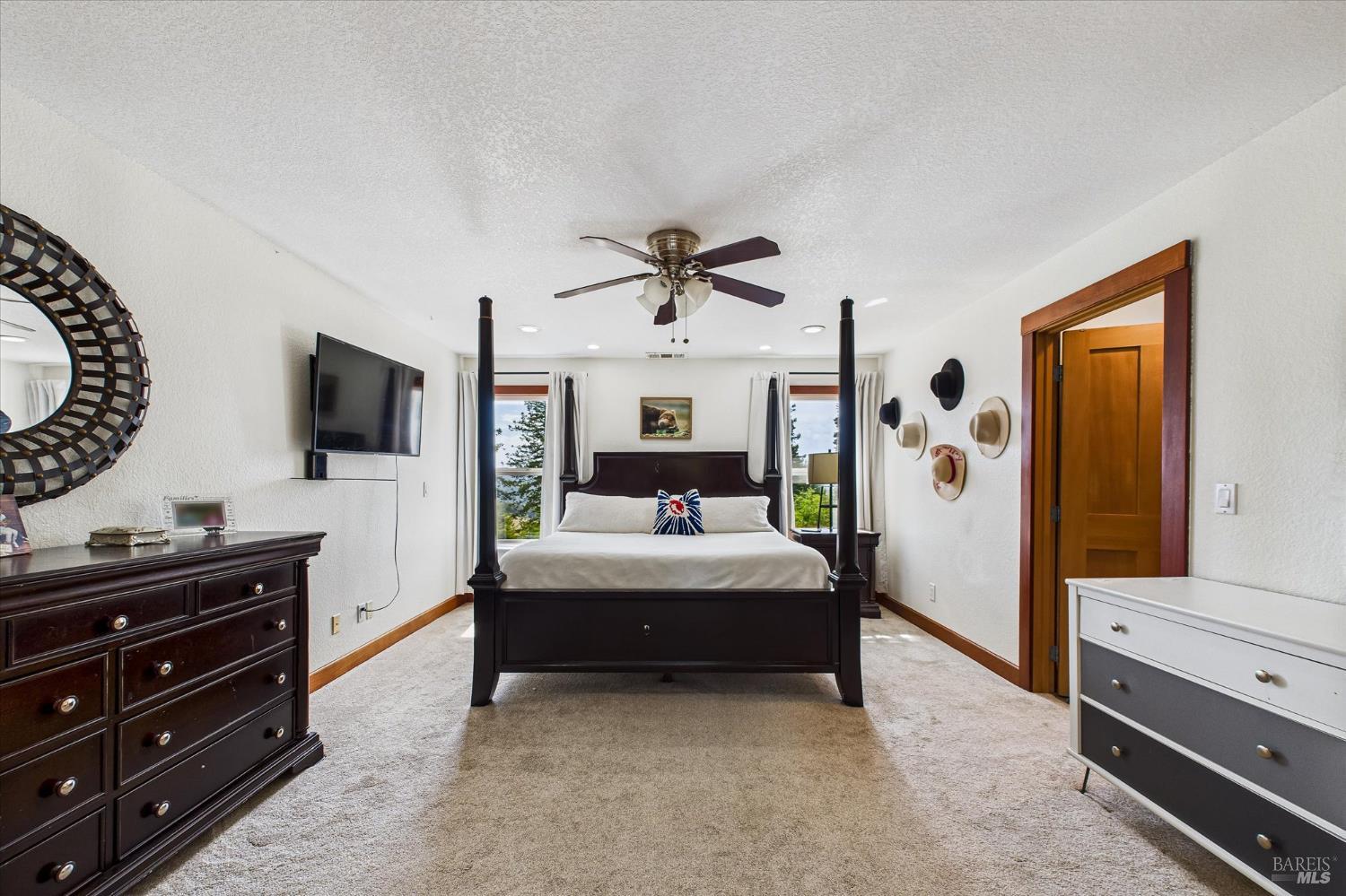 1150 Dinsmore Ranch Road Rio Dell, CA 95562 - Photo 49 of 71 a living room with furniture and a flat screen tv