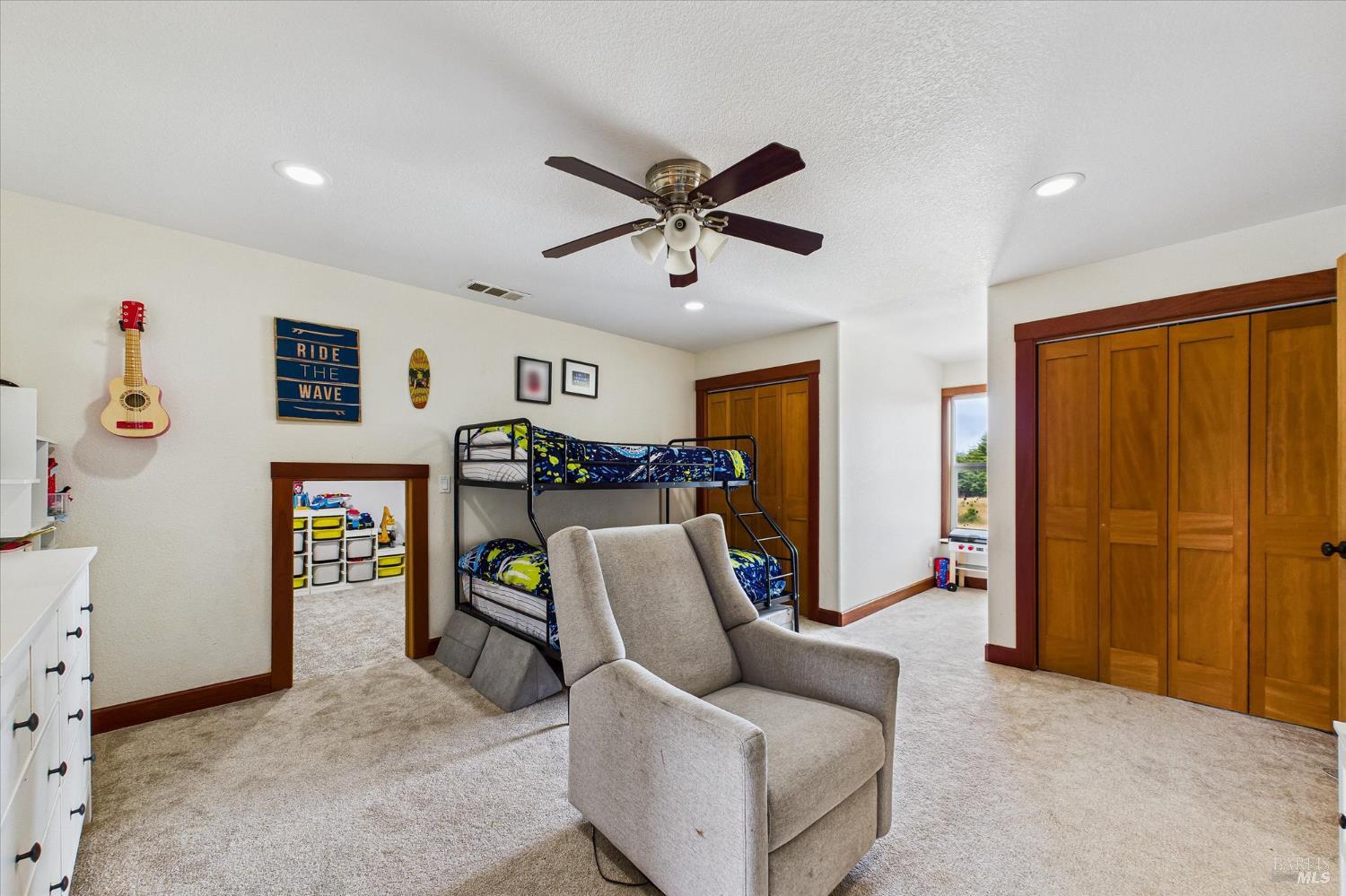 1150 Dinsmore Ranch Road Rio Dell, CA 95562 - Photo 61 of 71 a living room with furniture and a flat screen tv