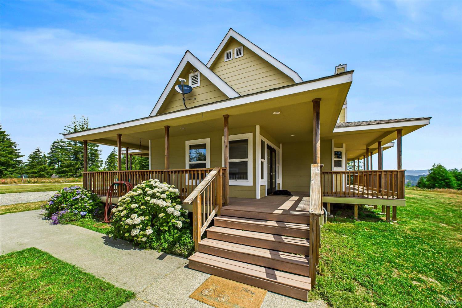 1150 Dinsmore Ranch Road Rio Dell, CA 95562 - Photo 65 of 71 front view of a house with a yard