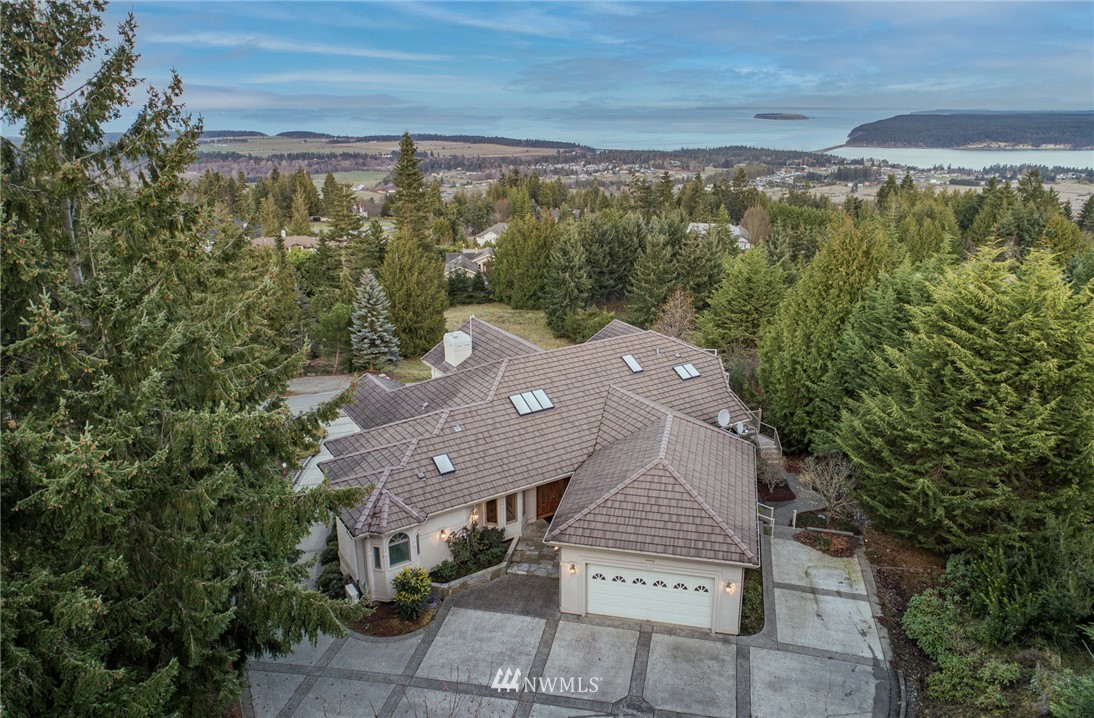53 Quails Roost Road Sequim, WA 98382 - Photo 2 of 40 an aerial view of a house with a yard