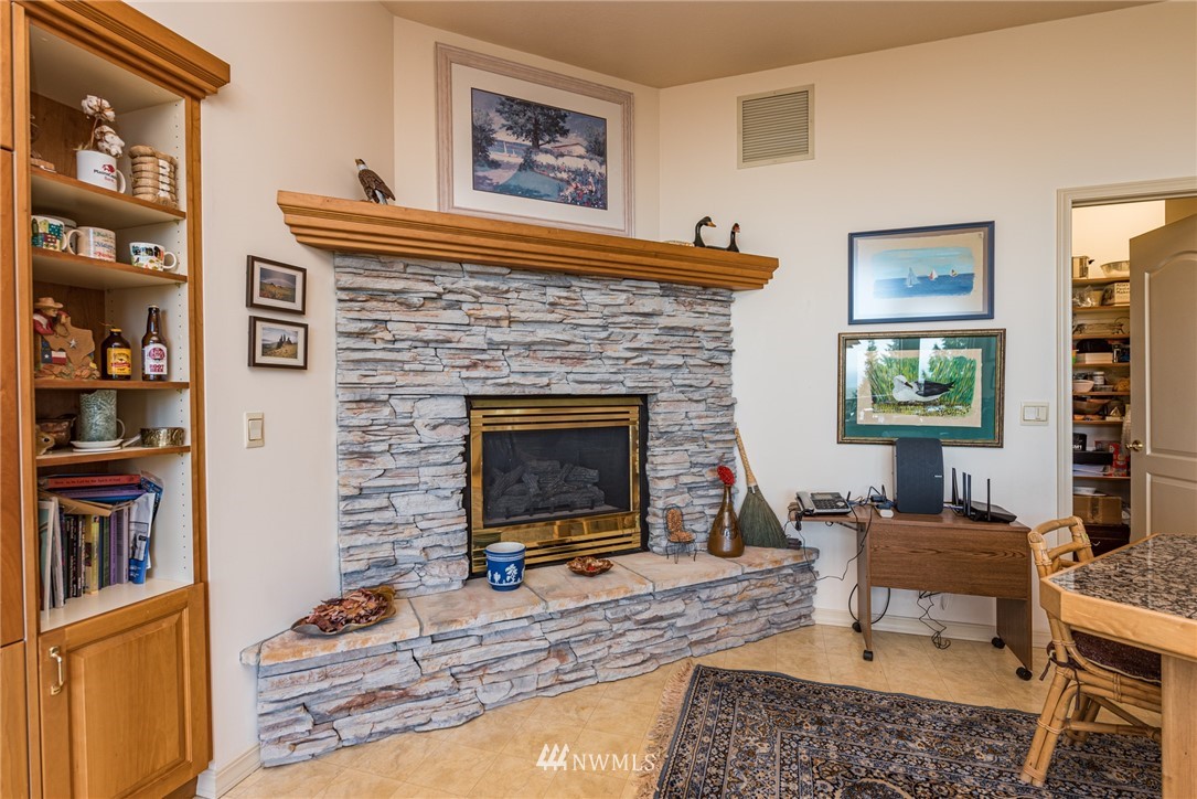 53 Quails Roost Road Sequim, WA 98382 - Photo 12 of 40 a living room with furniture and a fireplace
