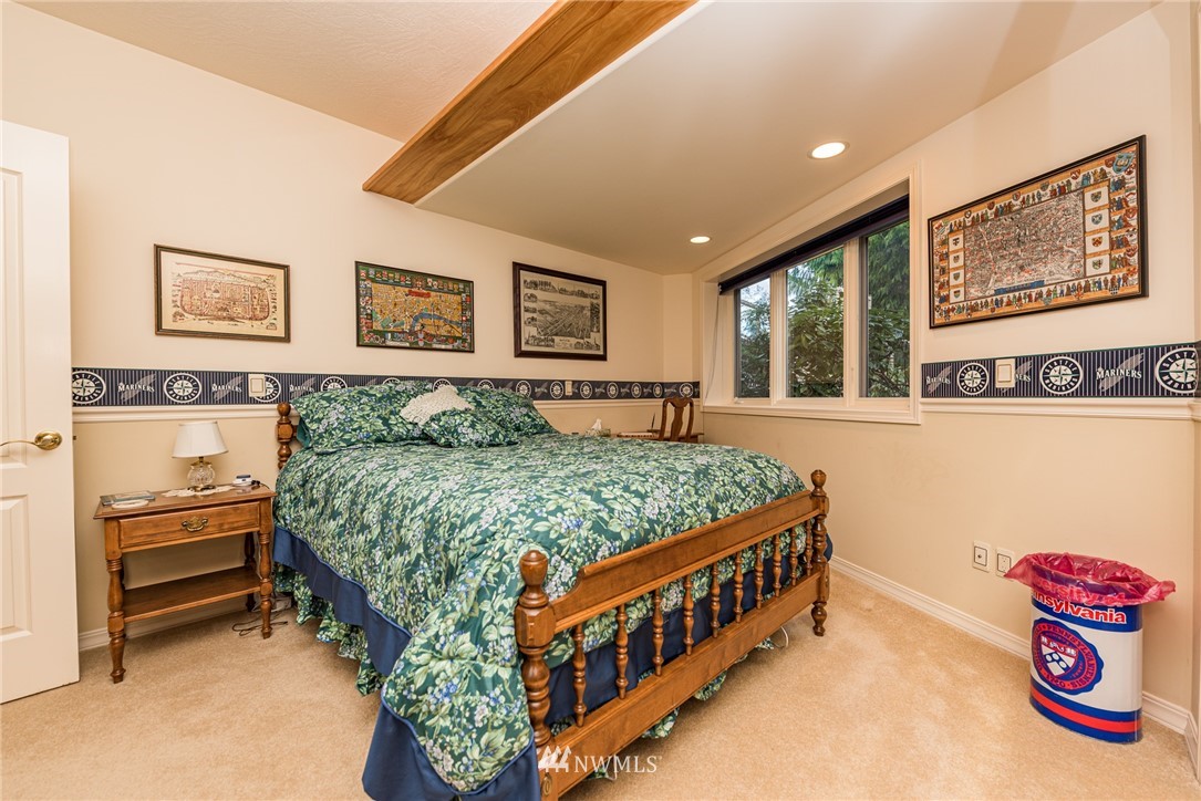 53 Quails Roost Road Sequim, WA 98382 - Photo 35 of 40 a bedroom with a bed and a window