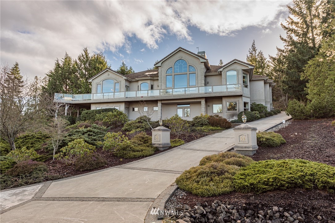 53 Quails Roost Road Sequim, WA 98382 - Photo 39 of 40 a front view of a house with garden