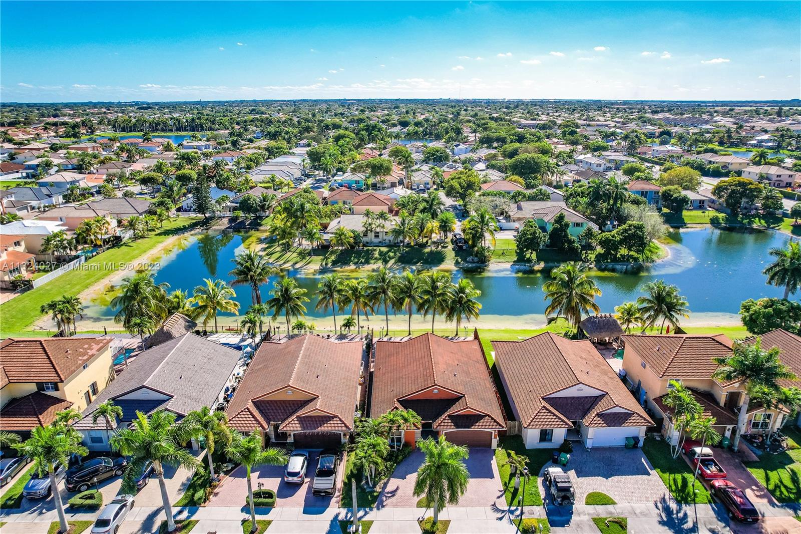 16056 Southwest 66th Terrace Miami, FL 33193 - Photo 2 of 24 an aerial view of residential house with outdoor space and lake view in back