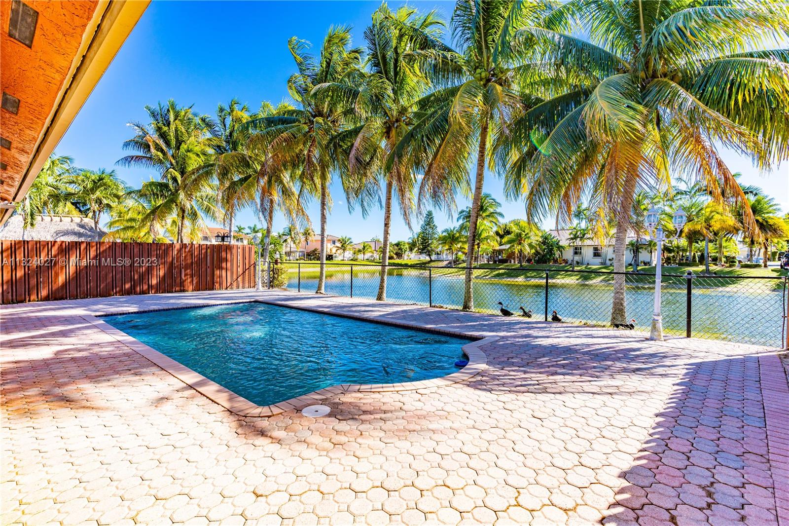 16056 Southwest 66th Terrace Miami, FL 33193 - Photo 21 of 24 a view of a backyard