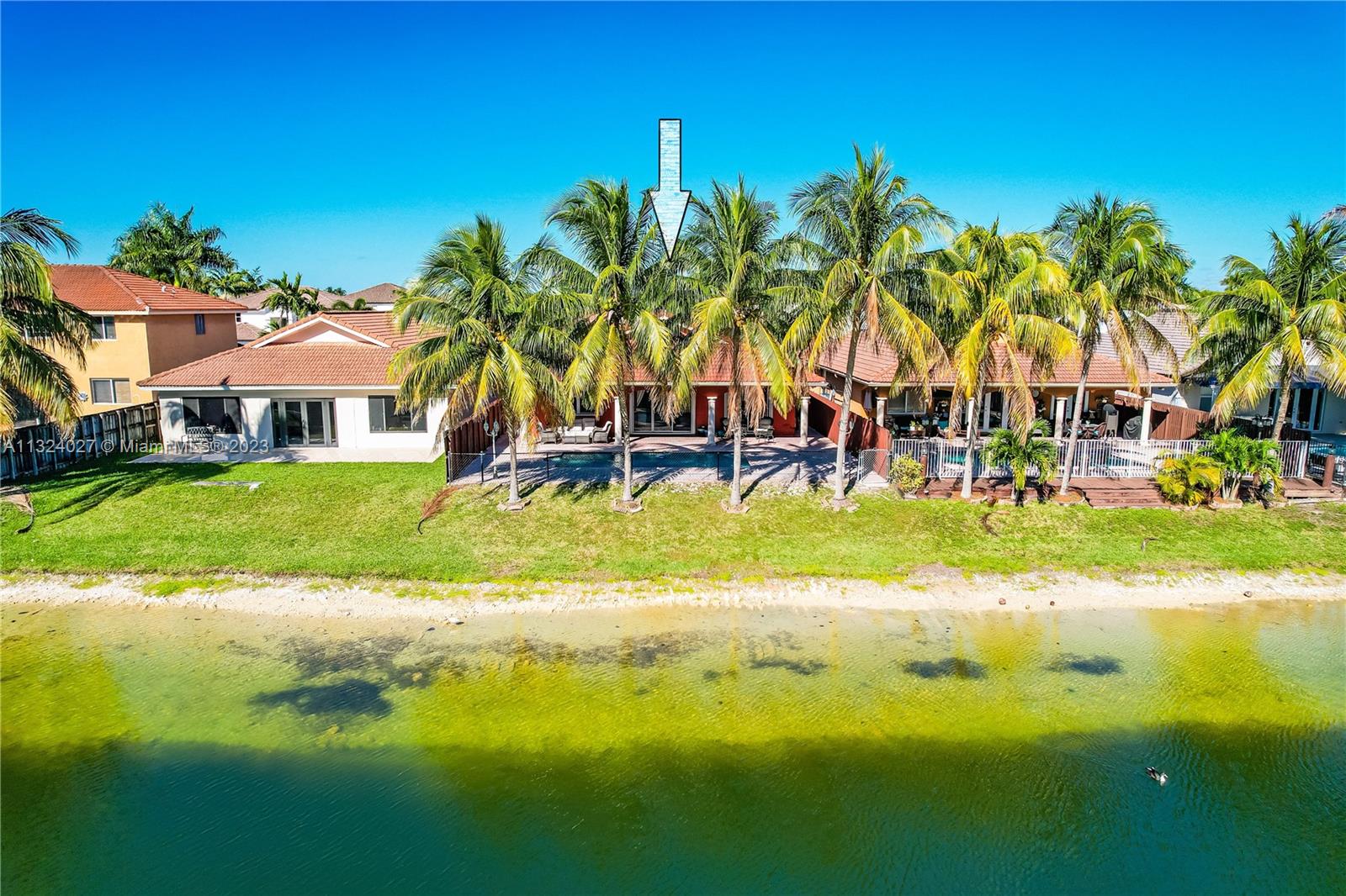 16056 Southwest 66th Terrace Miami, FL 33193 - Photo 23 of 24 a view of a yard with swimming pool
