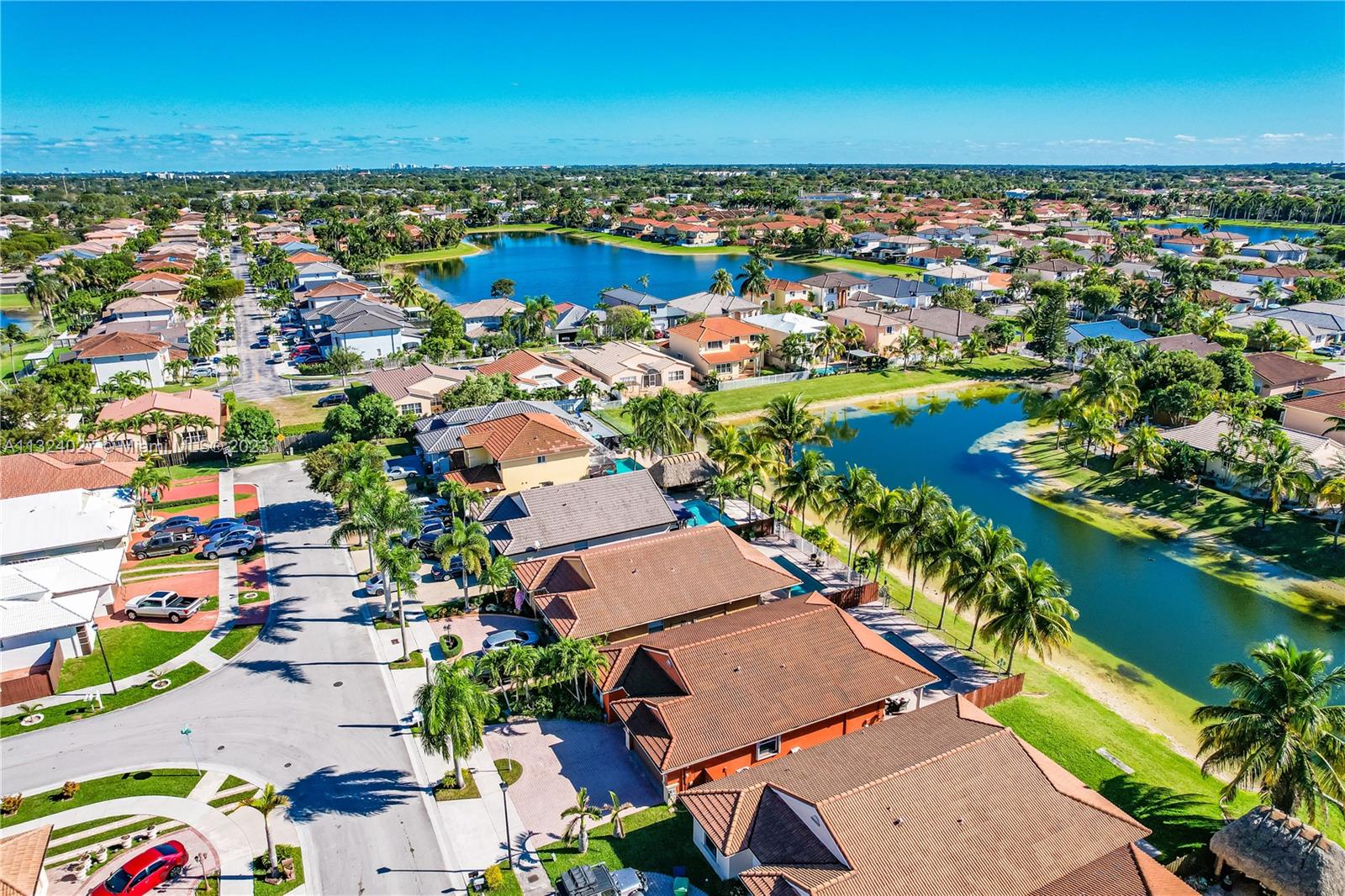 16056 Southwest 66th Terrace Miami, FL 33193 - Photo 24 of 24 an aerial view of a houses with a lake view