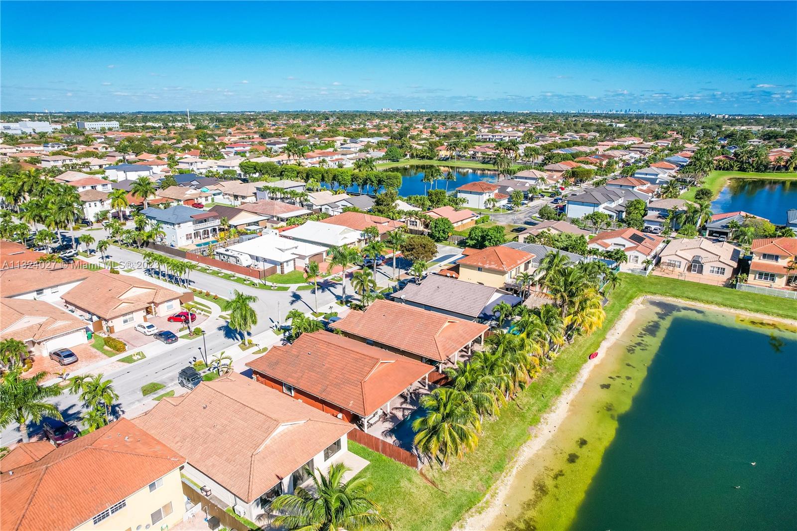 16056 Southwest 66th Terrace Miami, FL 33193 - Photo 3 of 24 an aerial view of a city