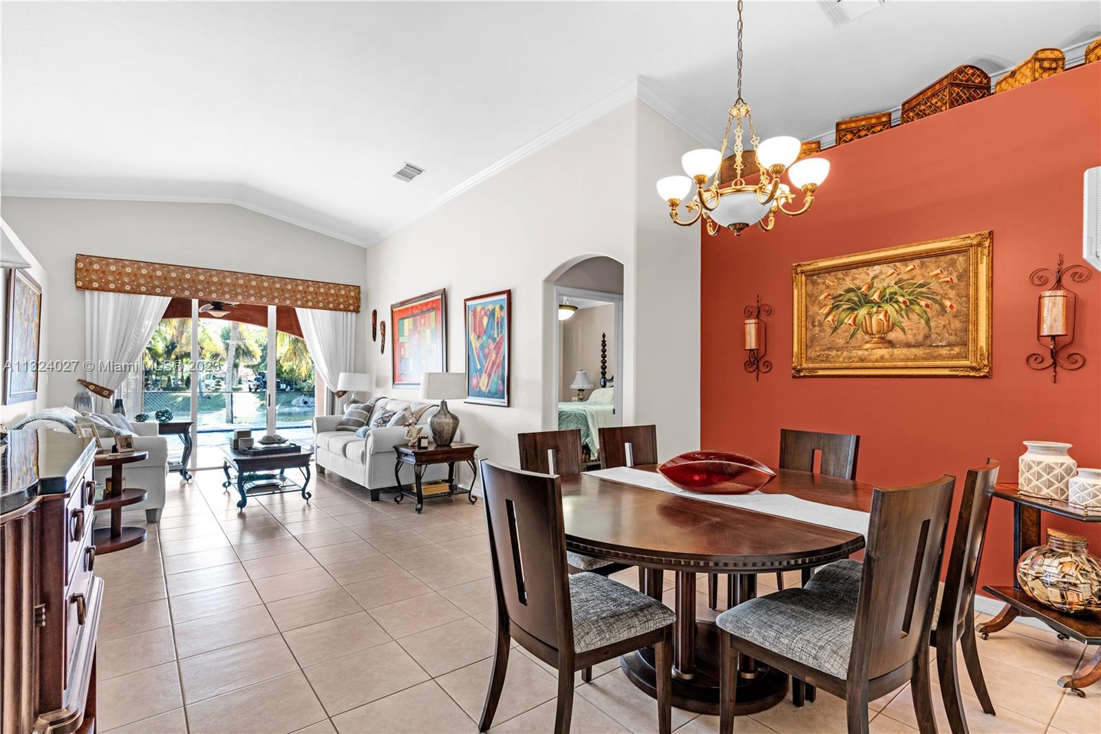 16056 Southwest 66th Terrace Miami, FL 33193 - Photo 5 of 24 a view of a dining room with furniture window and outside view