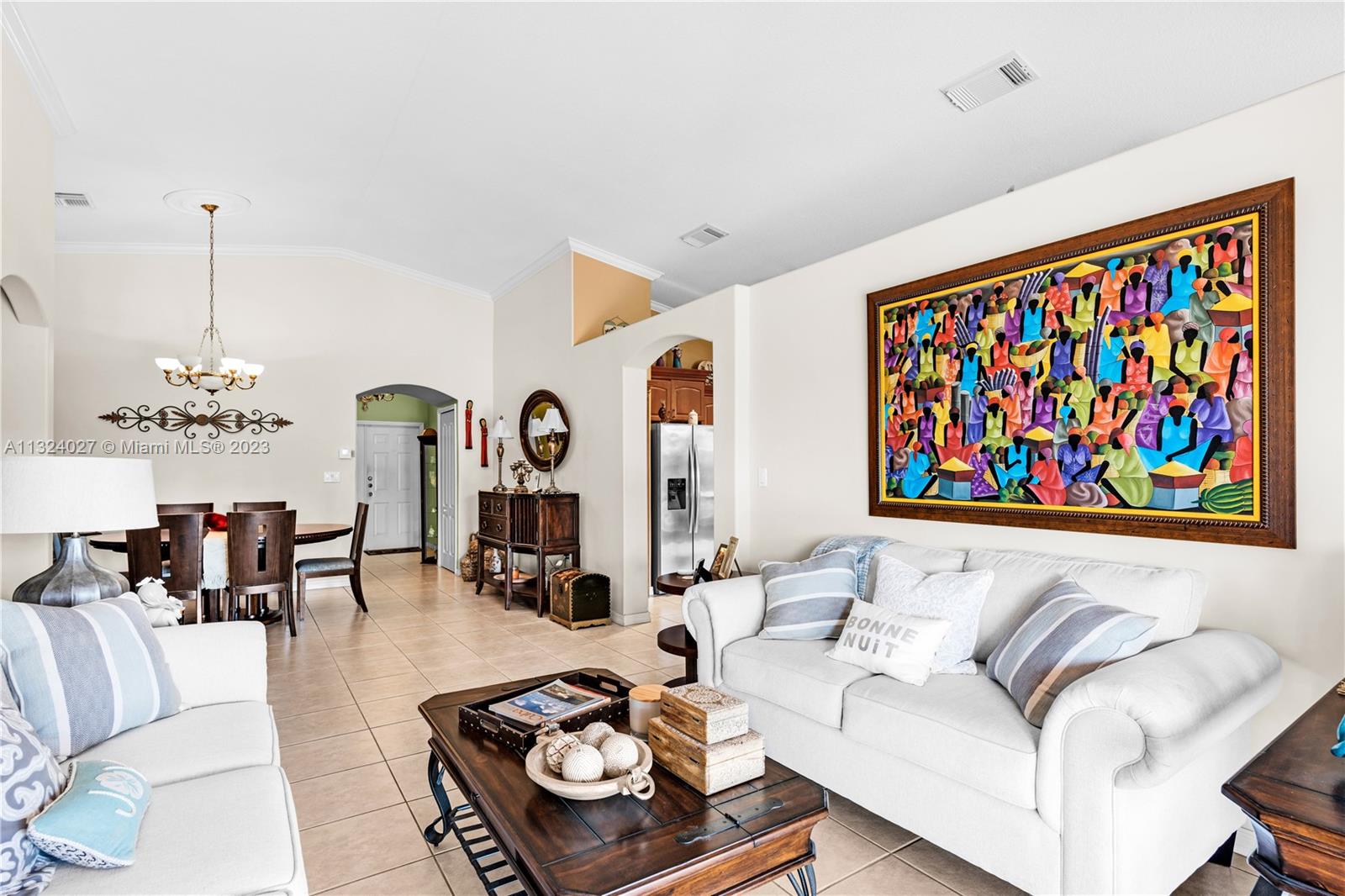16056 Southwest 66th Terrace Miami, FL 33193 - Photo 7 of 24 a living room with furniture and a table