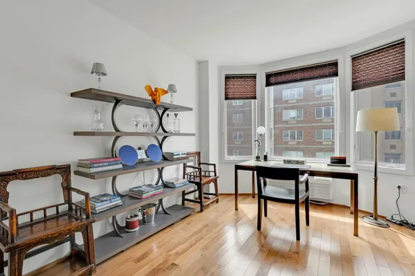 a view of a livingroom with furniture and wooden floor