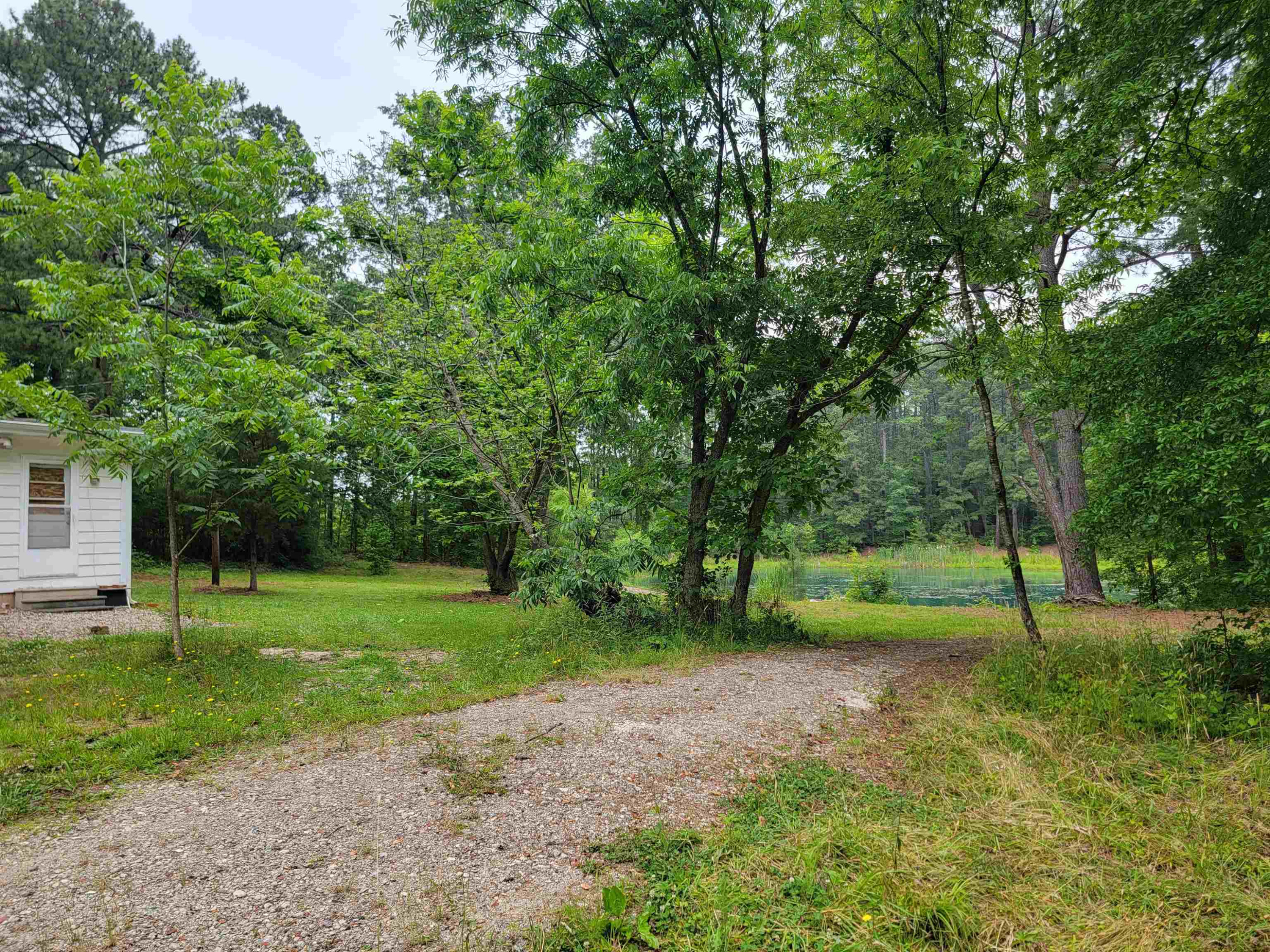 3217 Rowena Avenue Durham, NC 27703 - Photo 17 of 30 a view of green field with trees in the background