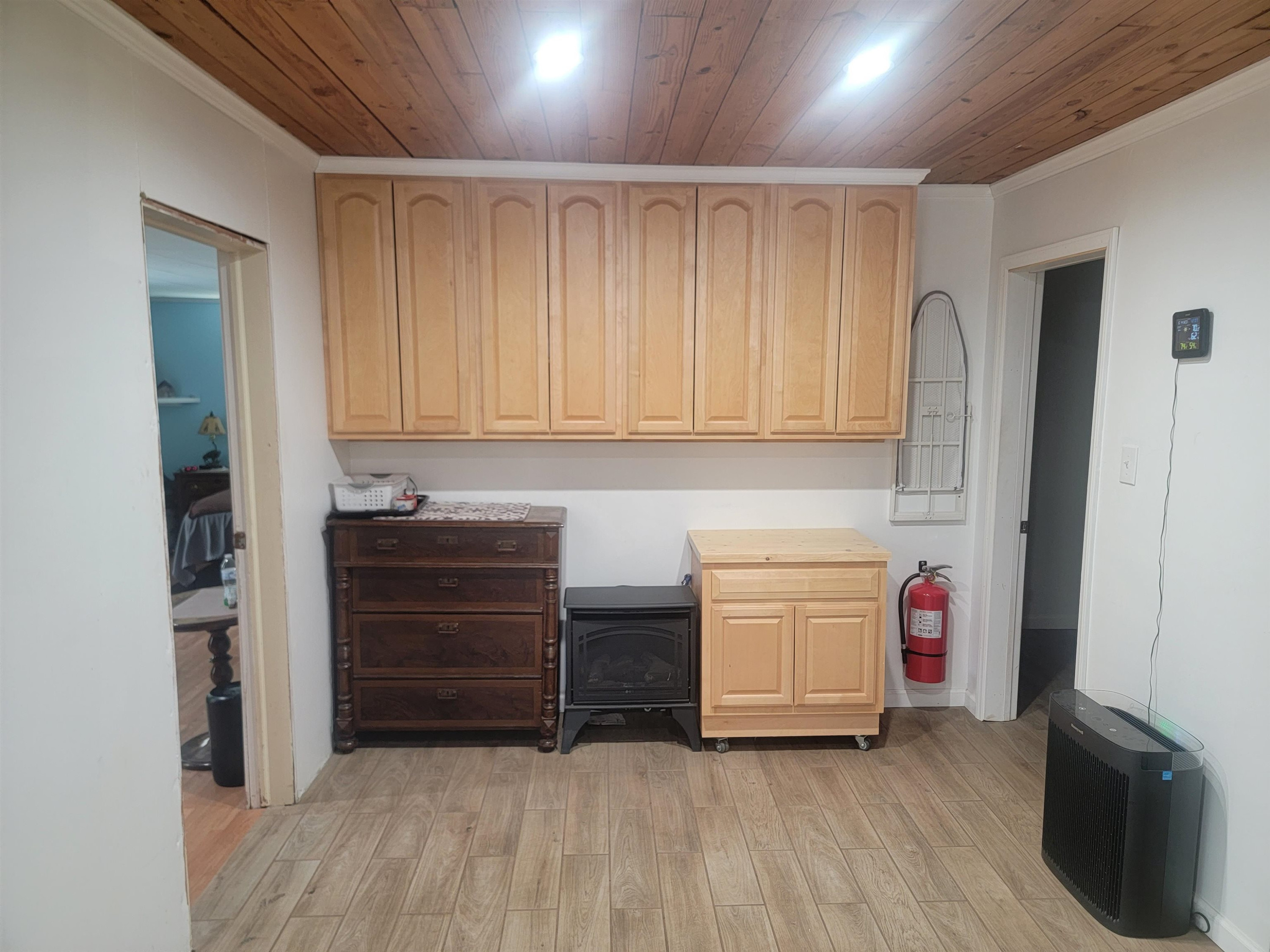 3217 Rowena Avenue Durham, NC 27703 - Photo 27 of 30 a room with storage and utility