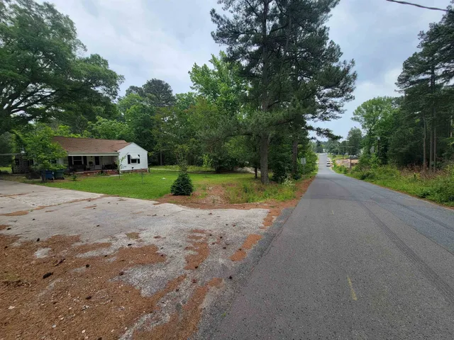 a view of a street with a houses