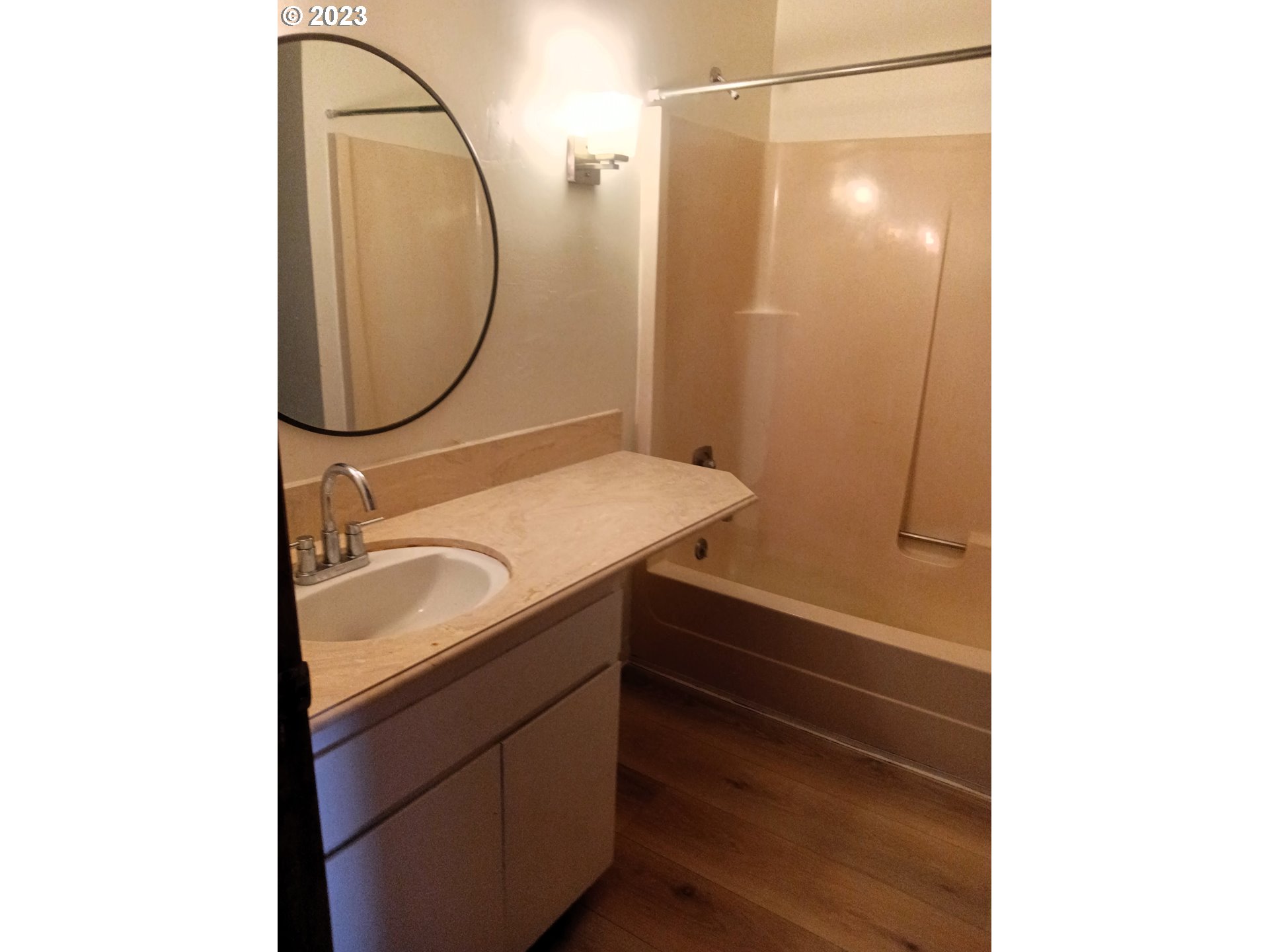 12998 Southwest Gentry Lane Beaverton, OR 97005 - Photo 17 of 22 a bathroom with a sink and a mirror