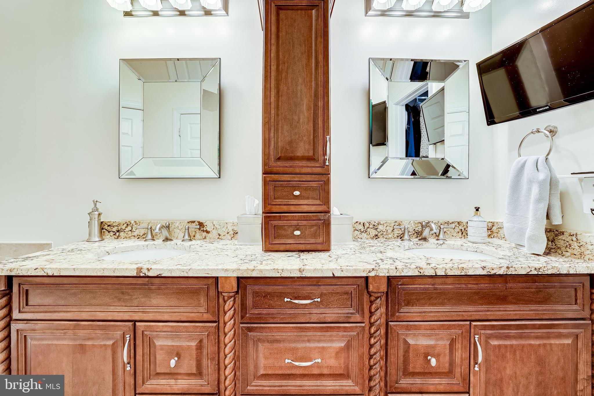 1369 Park Garden Lane Reston, VA 20194 - Photo 16 of 46 Double sink vanity in updated bathroom