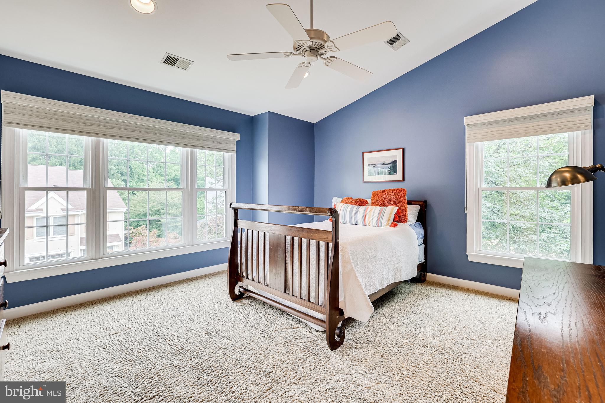 1369 Park Garden Lane Reston, VA 20194 - Photo 22 of 46 Large front bedroom with ceiling fan and WI closet