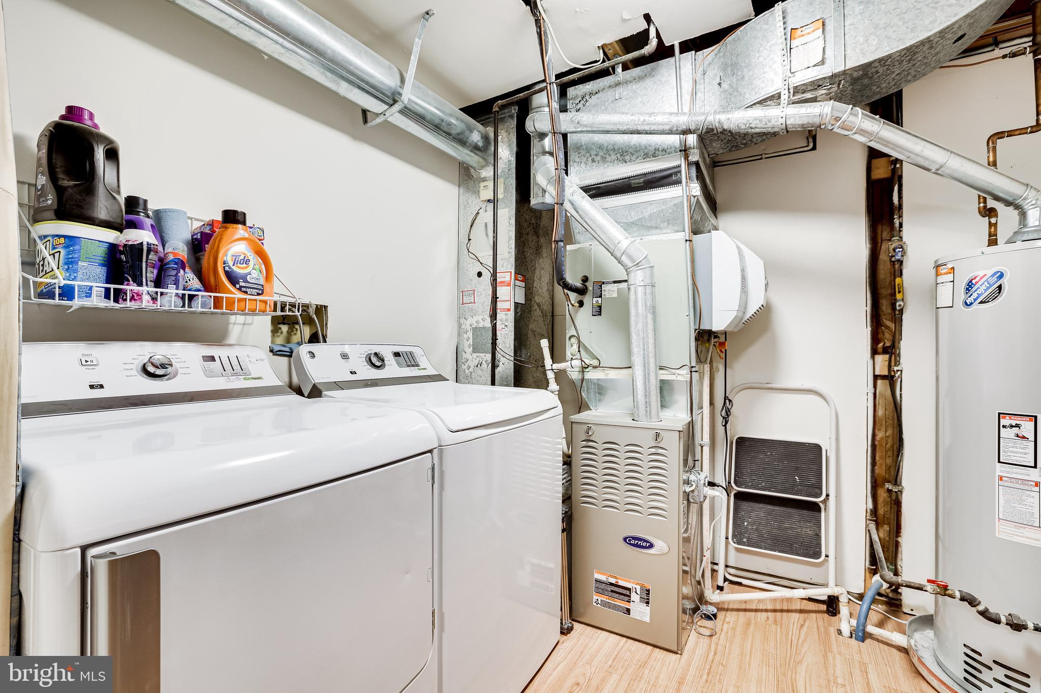 1369 Park Garden Lane Reston, VA 20194 - Photo 29 of 46 Laundry room with space for sorting and drying